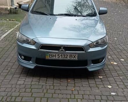 Синий Мицубиси Лансер, объемом двигателя 2 л и пробегом 300 тыс. км за 6900 $, фото 4 на Automoto.ua