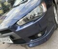 Синий Мицубиси Лансер, объемом двигателя 2 л и пробегом 205 тыс. км за 5899 $, фото 16 на Automoto.ua