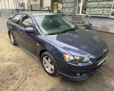 Синий Мицубиси Лансер, объемом двигателя 2 л и пробегом 200 тыс. км за 6700 $, фото 2 на Automoto.ua