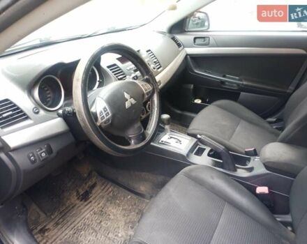 Синій Міцубісі Lancer, об'ємом двигуна 2 л та пробігом 265 тис. км за 5700 $, фото 6 на Automoto.ua