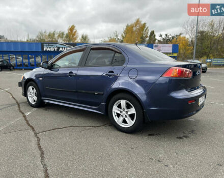 Синій Міцубісі Lancer, об'ємом двигуна 2 л та пробігом 265 тис. км за 6250 $, фото 7 на Automoto.ua