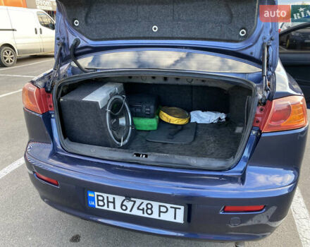 Синий Мицубиси Лансер, объемом двигателя 1.5 л и пробегом 247 тыс. км за 4500 $, фото 4 на Automoto.ua