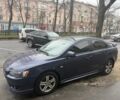 Синий Мицубиси Лансер, объемом двигателя 2 л и пробегом 200 тыс. км за 6700 $, фото 5 на Automoto.ua