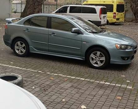 Синий Мицубиси Лансер, объемом двигателя 2 л и пробегом 300 тыс. км за 6900 $, фото 1 на Automoto.ua