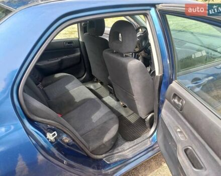 Синій Міцубісі Lancer, об'ємом двигуна 1.6 л та пробігом 275 тис. км за 5100 $, фото 10 на Automoto.ua