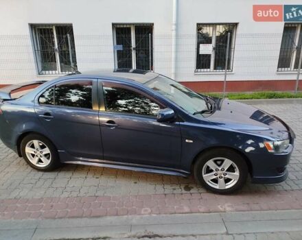 Синій Міцубісі Lancer, об'ємом двигуна 2 л та пробігом 290 тис. км за 5000 $, фото 1 на Automoto.ua