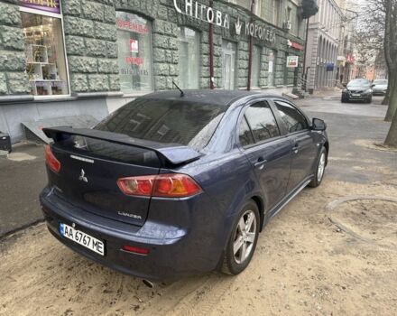 Синий Мицубиси Лансер, объемом двигателя 2 л и пробегом 200 тыс. км за 6700 $, фото 7 на Automoto.ua