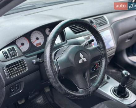 Синий Мицубиси Лансер, объемом двигателя 1.6 л и пробегом 187 тыс. км за 3799 $, фото 17 на Automoto.ua