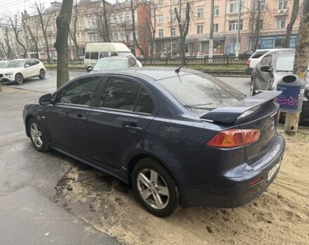Синий Мицубиси Лансер, объемом двигателя 2 л и пробегом 200 тыс. км за 6700 $, фото 6 на Automoto.ua