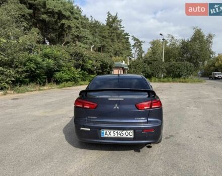 Синій Міцубісі Lancer, об'ємом двигуна 2 л та пробігом 300 тис. км за 5800 $, фото 5 на Automoto.ua