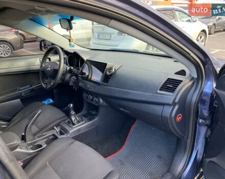 Синий Мицубиси Лансер, объемом двигателя 1.5 л и пробегом 247 тыс. км за 4500 $, фото 5 на Automoto.ua