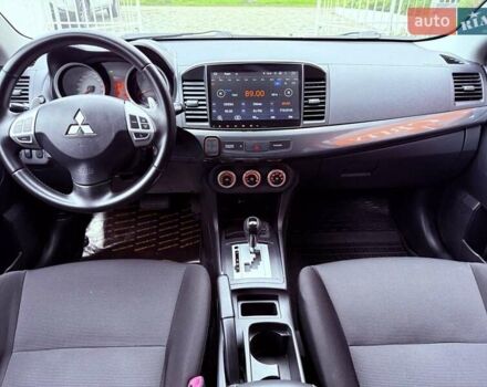 Синий Мицубиси Лансер, объемом двигателя 2 л и пробегом 186 тыс. км за 7200 $, фото 4 на Automoto.ua