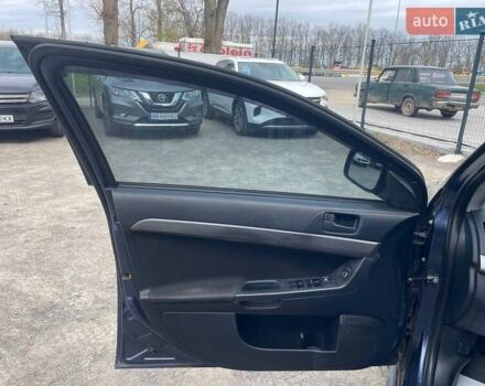 Синий Мицубиси Лансер, объемом двигателя 2 л и пробегом 142 тыс. км за 8000 $, фото 23 на Automoto.ua