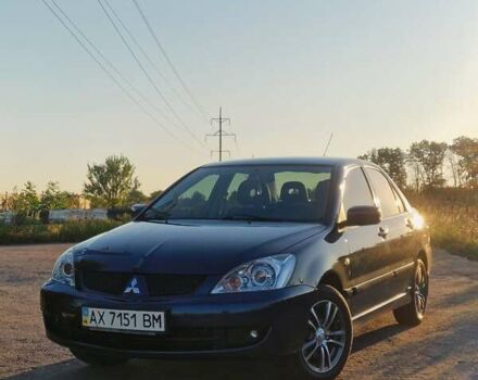 Синий Мицубиси Лансер, объемом двигателя 1.6 л и пробегом 197 тыс. км за 6500 $, фото 2 на Automoto.ua