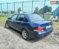 Синій Міцубісі Lancer, об'ємом двигуна 1.6 л та пробігом 275 тис. км за 5100 $, фото 1 на Automoto.ua