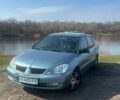 Синий Мицубиси Лансер, объемом двигателя 1.58 л и пробегом 226 тыс. км за 5300 $, фото 1 на Automoto.ua