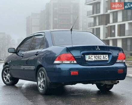 Синий Мицубиси Лансер, объемом двигателя 1.6 л и пробегом 187 тыс. км за 3799 $, фото 11 на Automoto.ua