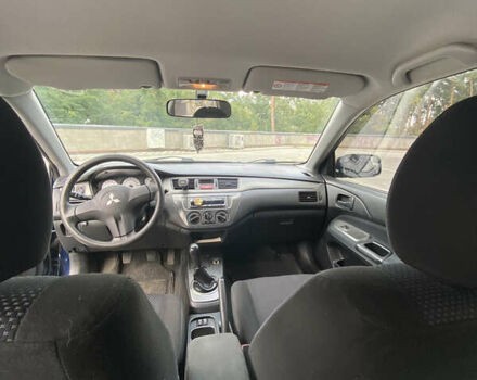 Синій Міцубісі Lancer, об'ємом двигуна 1.6 л та пробігом 206 тис. км за 5500 $, фото 9 на Automoto.ua