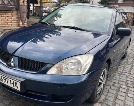Міцубісі Lancer 2008 у Рівному на Automoto.ua Синій Міцубісі Lancer, об'ємом двигуна 1.6 л та пробігом 158 тис. км за 3900 $, фото 16 на Automoto.ua