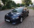 Синій Міцубісі Lancer, об'ємом двигуна 2 л та пробігом 290 тис. км за 5000 $, фото 1 на Automoto.ua