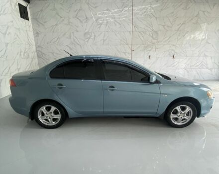 Синий Мицубиси Лансер, объемом двигателя 1.5 л и пробегом 261 тыс. км за 5500 $, фото 4 на Automoto.ua