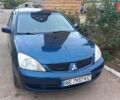 Синій Міцубісі Lancer, об'ємом двигуна 1.58 л та пробігом 220 тис. км за 4200 $, фото 1 на Automoto.ua