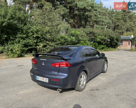 Синий Мицубиси Лансер, объемом двигателя 2 л и пробегом 299 тыс. км за 7100 $, фото 4 на Automoto.ua