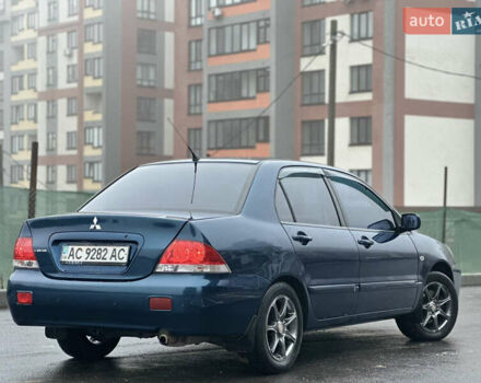 Синий Мицубиси Лансер, объемом двигателя 1.6 л и пробегом 187 тыс. км за 3799 $, фото 13 на Automoto.ua