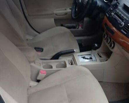 Синий Мицубиси Лансер, объемом двигателя 2 л и пробегом 300 тыс. км за 6900 $, фото 9 на Automoto.ua