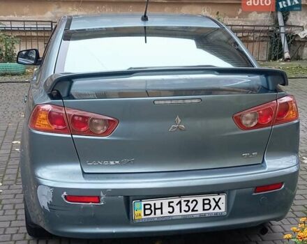 Синий Мицубиси Лансер, объемом двигателя 2 л и пробегом 300 тыс. км за 5600 $, фото 2 на Automoto.ua