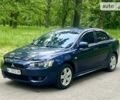 Синій Міцубісі Lancer, об'ємом двигуна 2 л та пробігом 130 тис. км за 7800 $, фото 1 на Automoto.ua