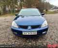Синий Мицубиси Лансер, объемом двигателя 16 л и пробегом 250 тыс. км за 4690 $, фото 7 на Automoto.ua