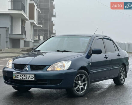 Синий Мицубиси Лансер, объемом двигателя 1.6 л и пробегом 187 тыс. км за 3799 $, фото 3 на Automoto.ua