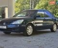 Синий Мицубиси Лансер, объемом двигателя 1.58 л и пробегом 176 тыс. км за 4700 $, фото 5 на Automoto.ua