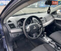 Міцубісі Lancer 2008 у Києві на Automoto.ua Синій Міцубісі Lancer, об'ємом двигуна 2 л та пробігом 265 тис. км за 6250 $, фото 9 на Automoto.ua