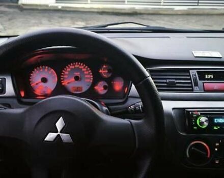 Синій Міцубісі Lancer, об'ємом двигуна 1.6 л та пробігом 206 тис. км за 5500 $, фото 10 на Automoto.ua