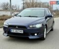 Синий Мицубиси Лансер, объемом двигателя 2 л и пробегом 290 тыс. км за 6999 $, фото 1 на Automoto.ua