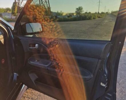 Синий Мицубиси Лансер, объемом двигателя 1.6 л и пробегом 197 тыс. км за 6500 $, фото 12 на Automoto.ua