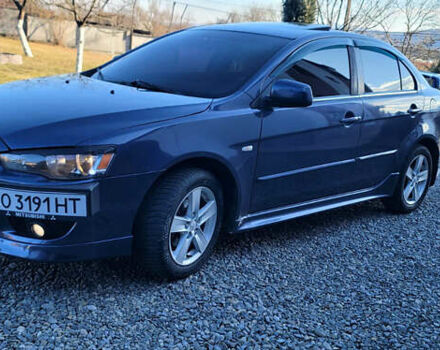 Синий Мицубиси Лансер, объемом двигателя 1.5 л и пробегом 241 тыс. км за 6500 $, фото 1 на Automoto.ua