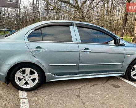 Синий Мицубиси Лансер, объемом двигателя 1.5 л и пробегом 250 тыс. км за 5150 $, фото 10 на Automoto.ua