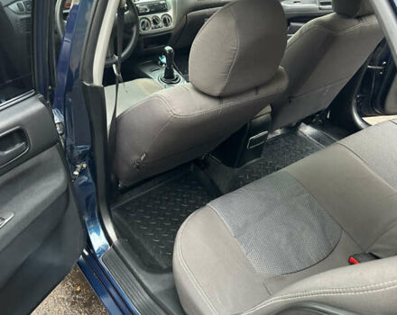 Синий Мицубиси Лансер, объемом двигателя 1.6 л и пробегом 150 тыс. км за 5700 $, фото 31 на Automoto.ua