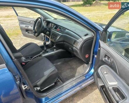 Синій Міцубісі Lancer, об'ємом двигуна 1.6 л та пробігом 275 тис. км за 5100 $, фото 8 на Automoto.ua
