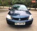 Синий Мицубиси Лансер, объемом двигателя 1.58 л и пробегом 303 тыс. км за 3000 $, фото 8 на Automoto.ua