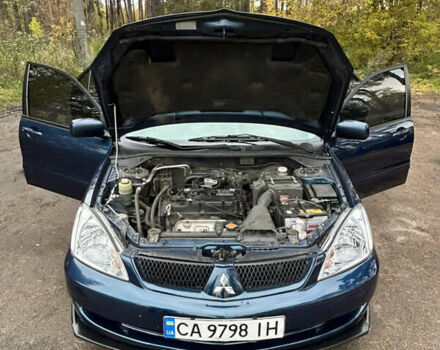 Синий Мицубиси Лансер, объемом двигателя 1.6 л и пробегом 150 тыс. км за 5700 $, фото 13 на Automoto.ua
