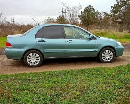 Синій Міцубісі Lancer, об'ємом двигуна 1.6 л та пробігом 167 тис. км за 4700 $, фото 6 на Automoto.ua