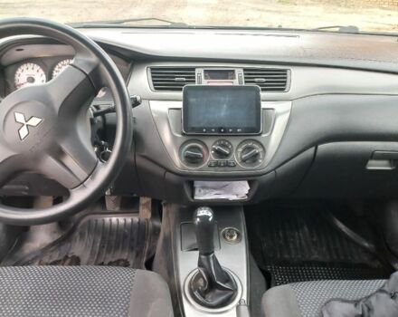 Синій Міцубісі Lancer, об'ємом двигуна 1.6 л та пробігом 220 тис. км за 4200 $, фото 5 на Automoto.ua