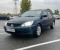Синий Мицубиси Лансер, объемом двигателя 1.58 л и пробегом 215 тыс. км за 4700 $, фото 1 на Automoto.ua
