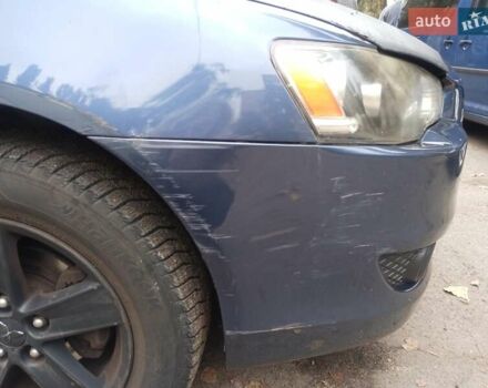 Синій Міцубісі Lancer, об'ємом двигуна 2 л та пробігом 265 тис. км за 5700 $, фото 3 на Automoto.ua