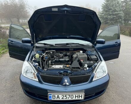 Синій Міцубісі Lancer, об'ємом двигуна 1.6 л та пробігом 126 тис. км за 5950 $, фото 8 на Automoto.ua