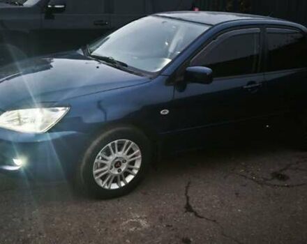 Синій Міцубісі Lancer, об'ємом двигуна 1.6 л та пробігом 206 тис. км за 5500 $, фото 13 на Automoto.ua